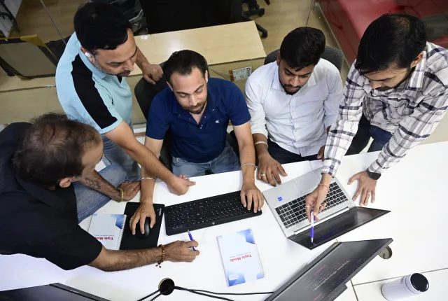 Native-speaking strategists planning an international SEO campaign